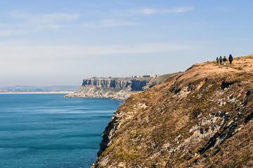 The group walking along the cliffside